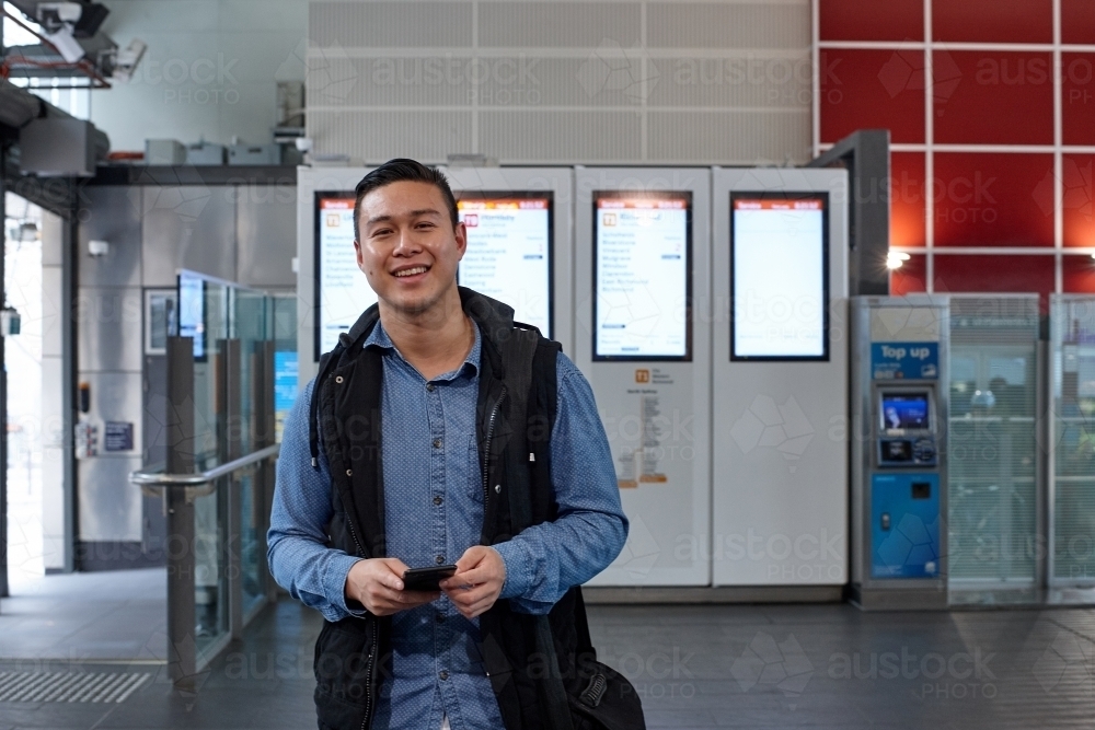 Man at train station - Australian Stock Image