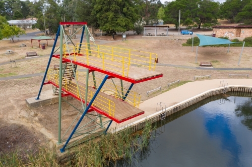 Aerial view of a double level diving platform over a lake