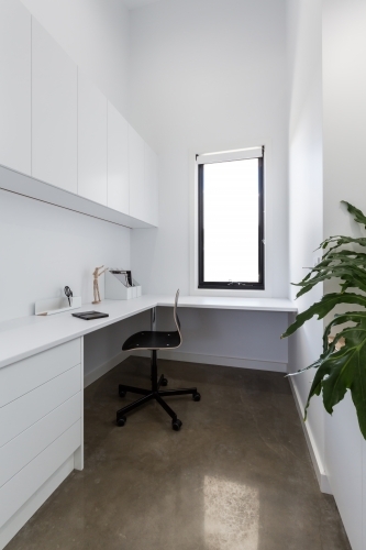 Clean crisp white study area in a contemporary home