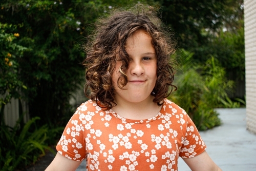 Close up shot of a girl with curly hair