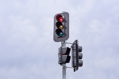 Cloudy sky background traffic lights