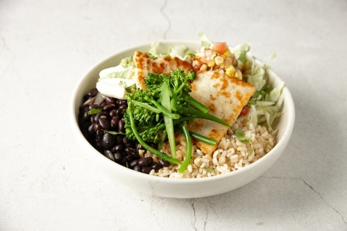 Halloumi dish with brocolini, beans and brown rice