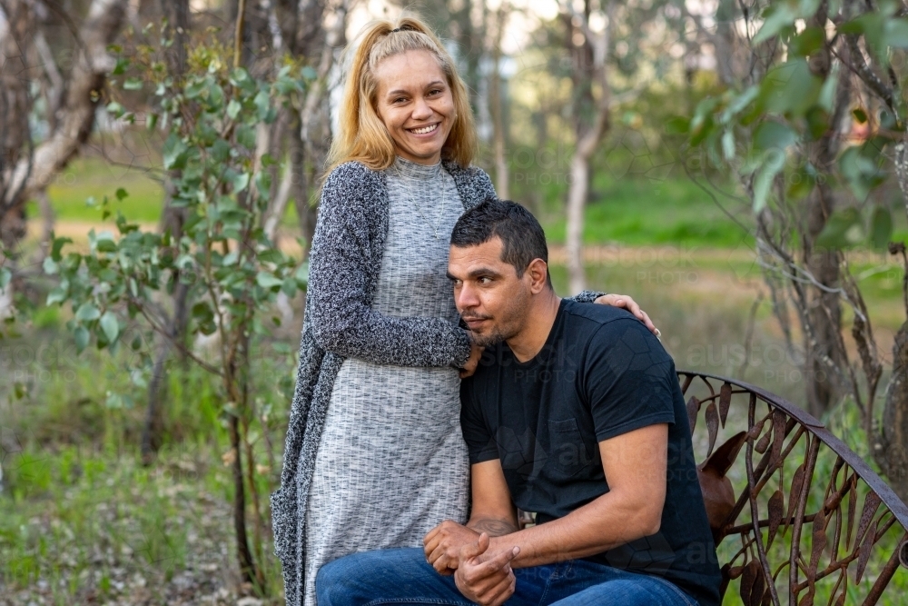 20 couple in their 20s together in bushland setting - Australian Stock Image