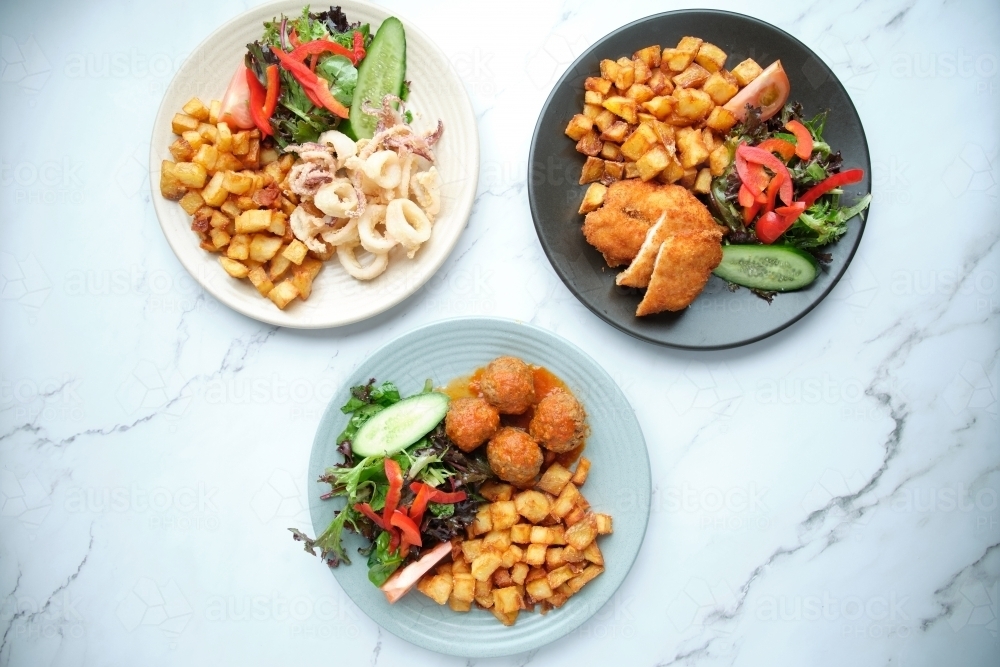 3 sets of plated salad meals - Australian Stock Image