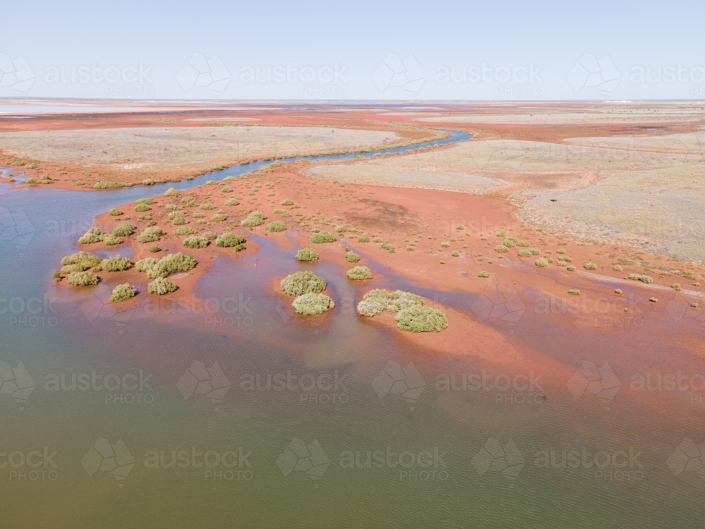 4 mile creek, Onslow, aerial view of red dirt and mangroves - Australian Stock Image