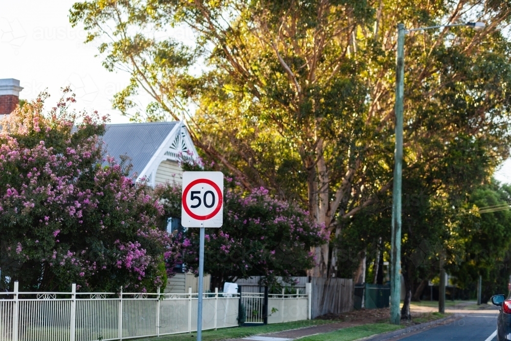 50 speed limit sign on roadside - Australian Stock Image