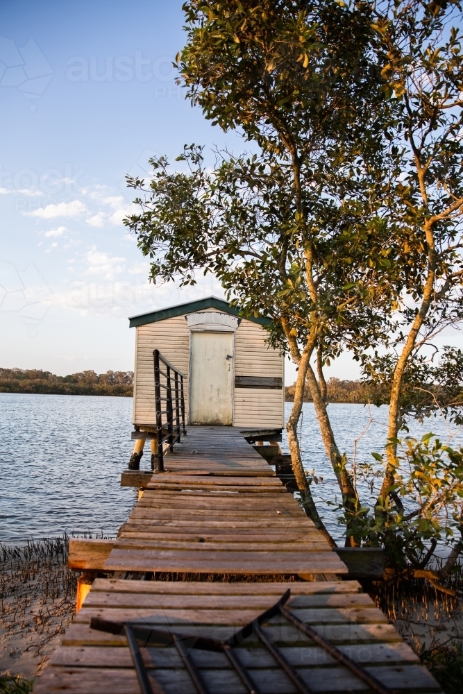 a jetty to an old boat house in Maroochydore - Australian Stock Image