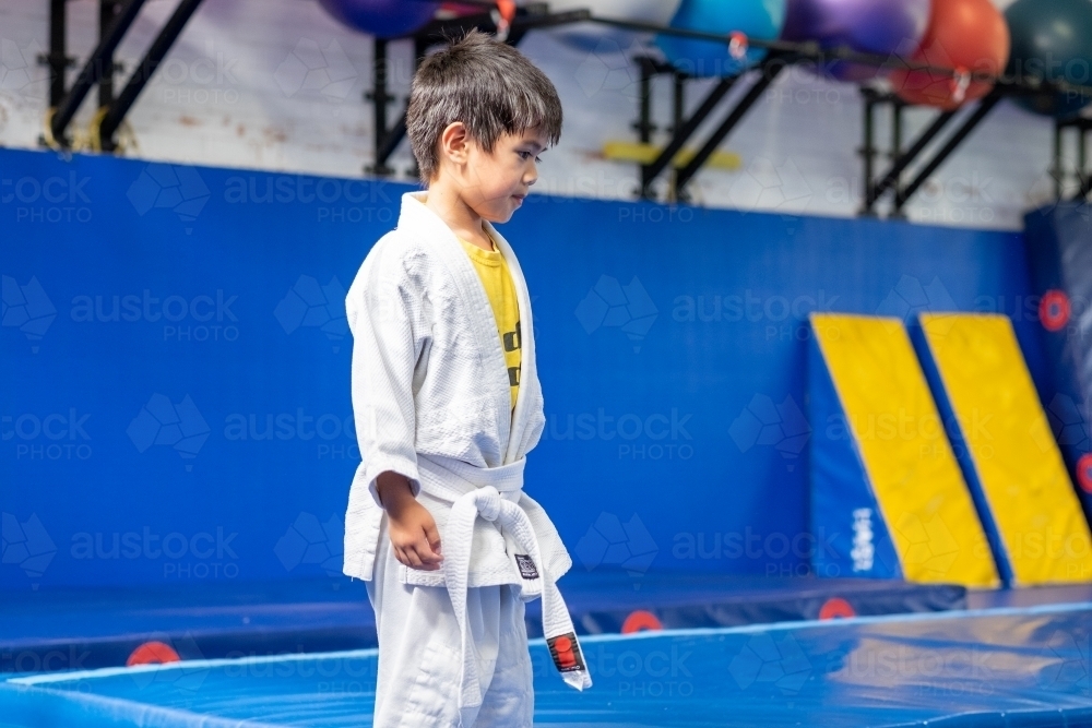 a kid participating in a judo session - Australian Stock Image