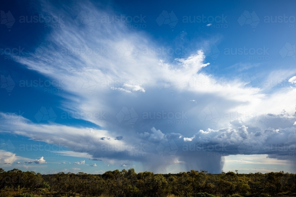 A late summer localised storm cloud near Winton in outback Queensland - Australian Stock Image