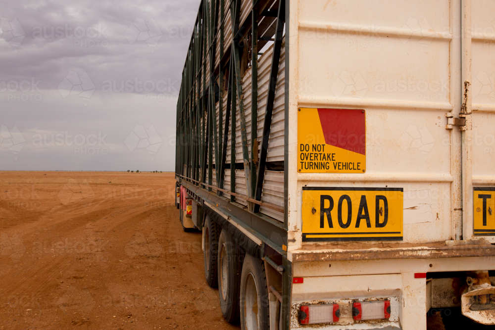 A livestock trailer with road train signs - Australian Stock Image