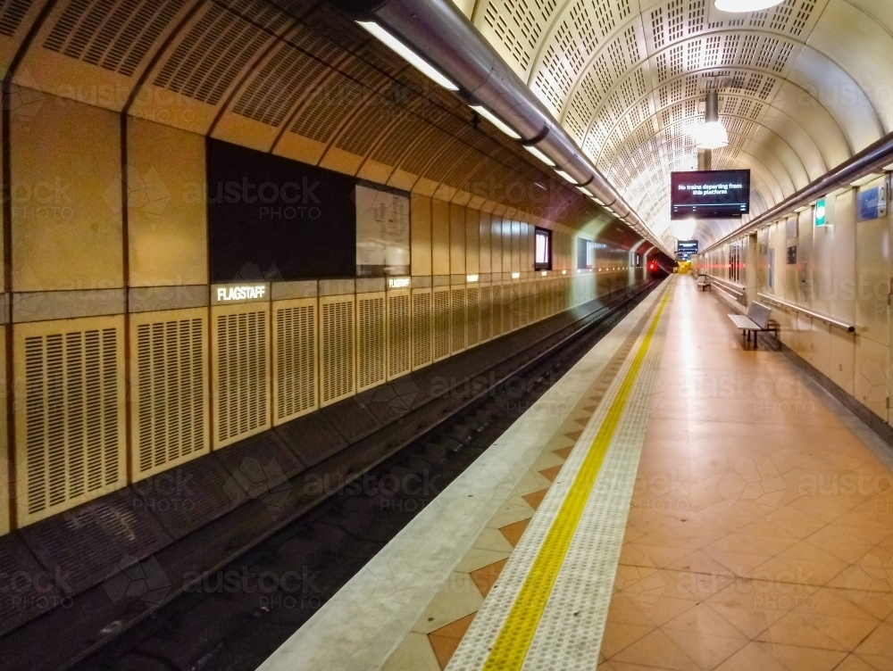 A long deserted platform of an underground railway station - Australian Stock Image