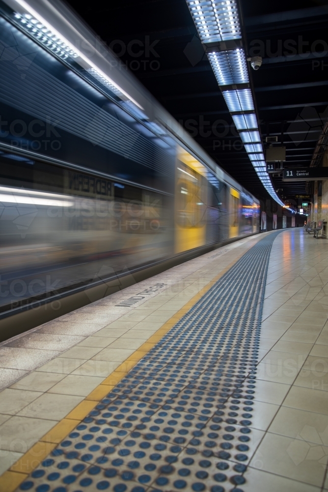 A train arriving at an underground platform in Sydney - Australian Stock Image