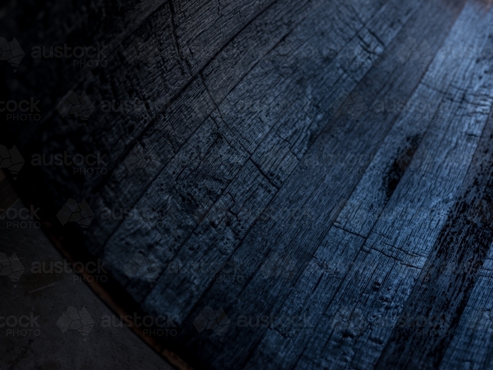 A whisky barrel being charred for storage - Australian Stock Image