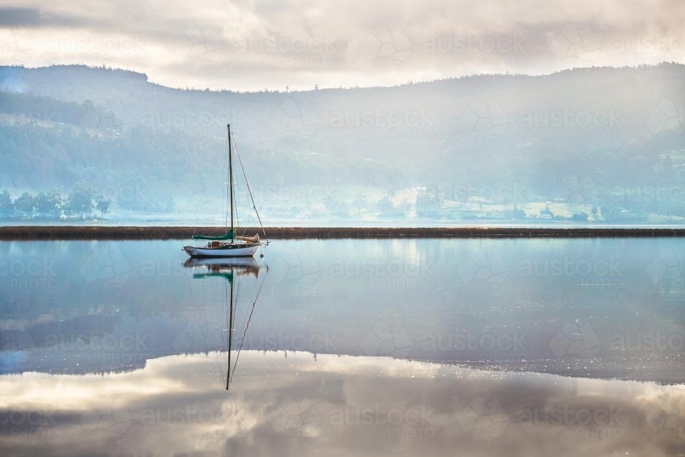 A yacht on a river - Australian Stock Image