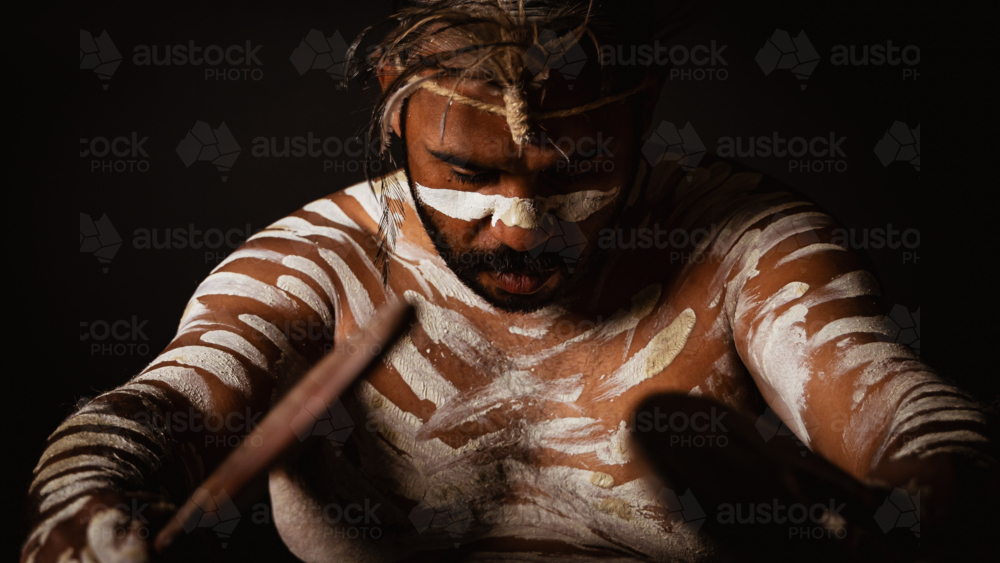 Aboriginal Male looking down - Australian Stock Image