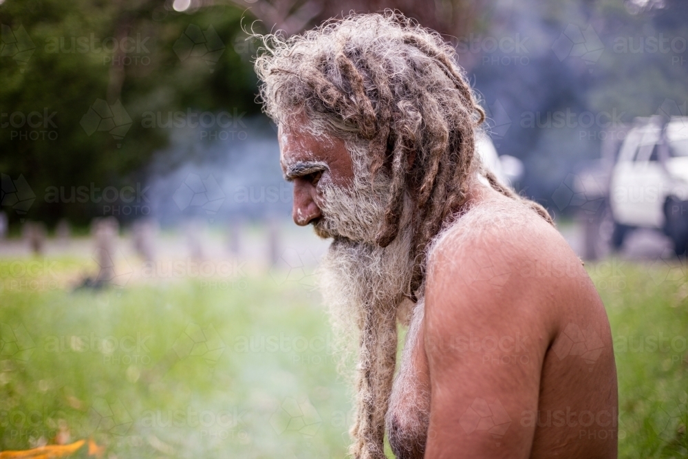 Aboriginal man at a smoking ceremony - Australian Stock Image