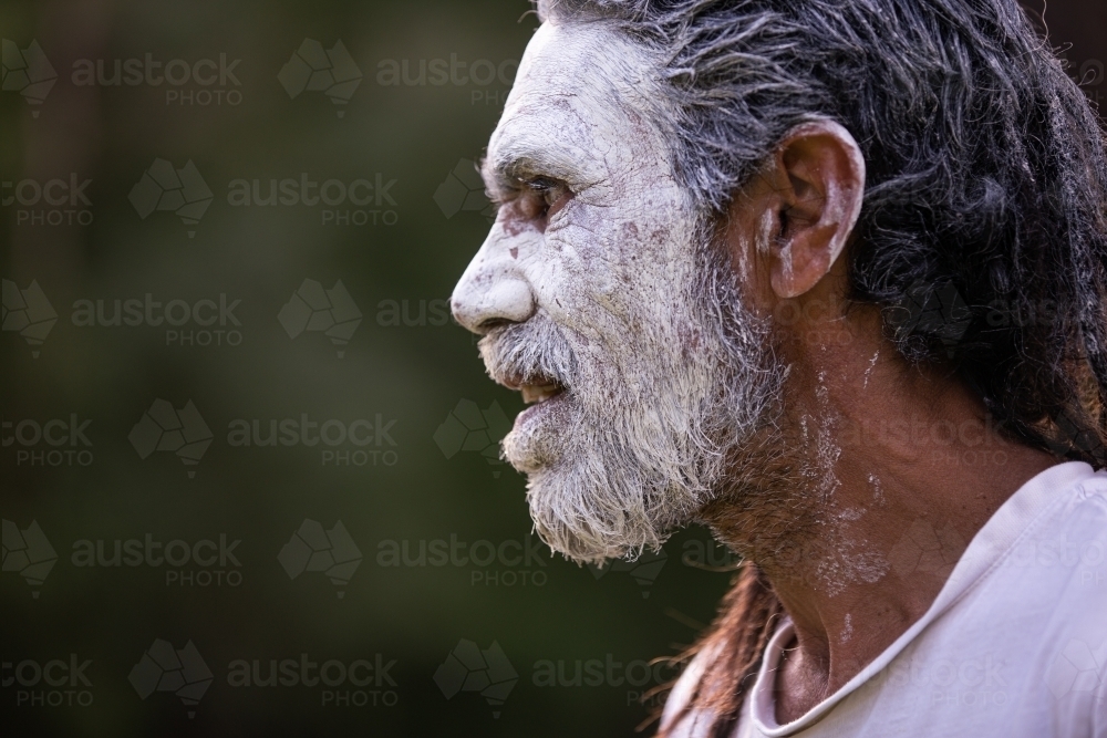 Aboriginal man wearing white face paint - Australian Stock Image