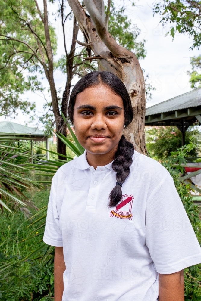 Aboriginal teenage school student looking at the camera - Australian Stock Image