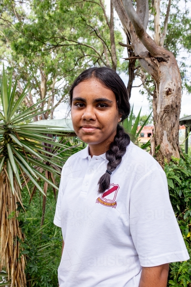 Aboriginal teenage school student looking at the camera - Australian Stock Image