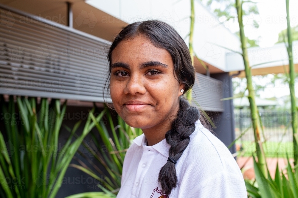 Aboriginal teenage school student looking at the camera - Australian Stock Image