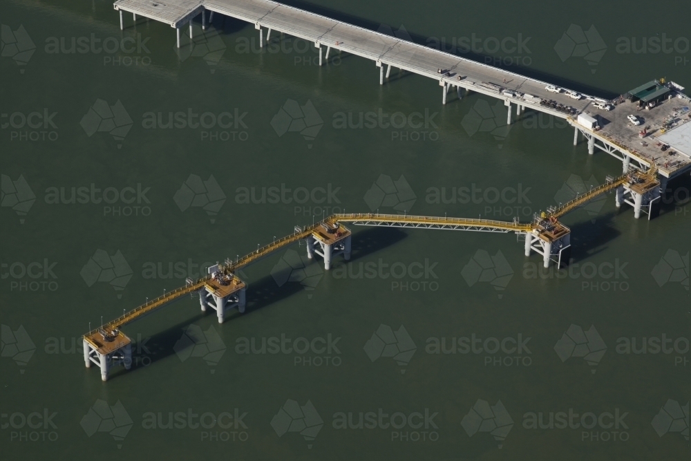 Aerial image of a large industrial bridge in water - Australian Stock Image