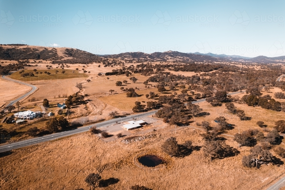 Aerial landscape of rolling countryside on the outskirts of Canberra ACT. - Australian Stock Image