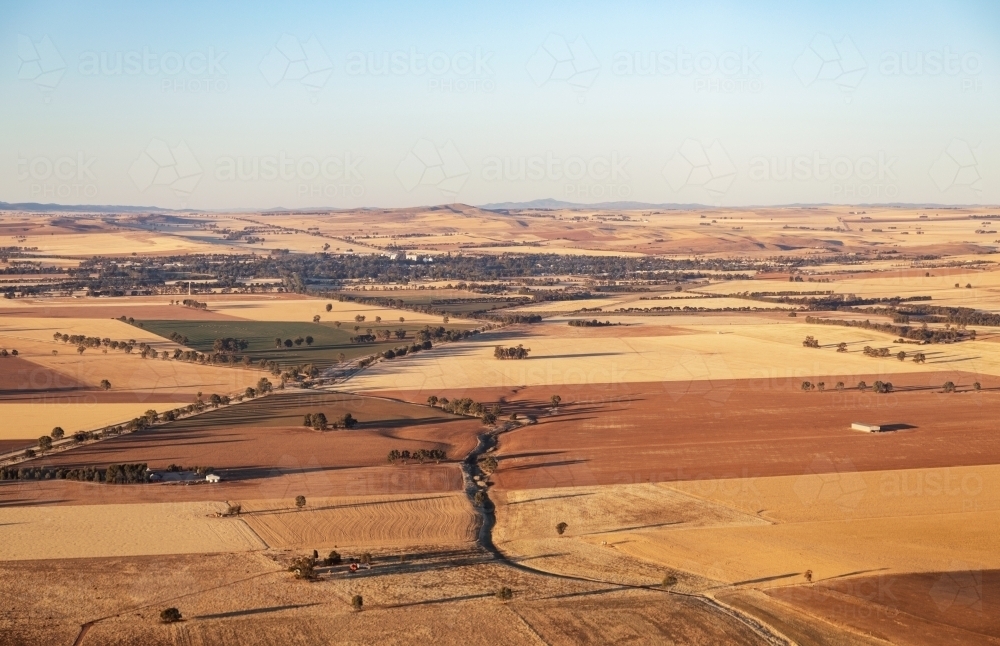 aerial of country town and farmland in summer - Australian Stock Image