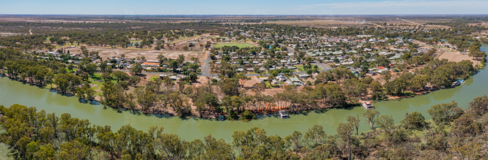 Aerial panorama of a rural township on the bend of an inland river - Australian Stock Image