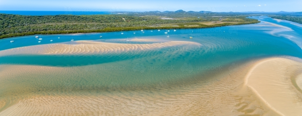 Aerial panorama of creek and sandbars at the Town of 1770, QLD. - Australian Stock Image