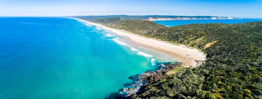 Aerial panorama of Double Island Point and Rainbow Beach. - Australian Stock Image