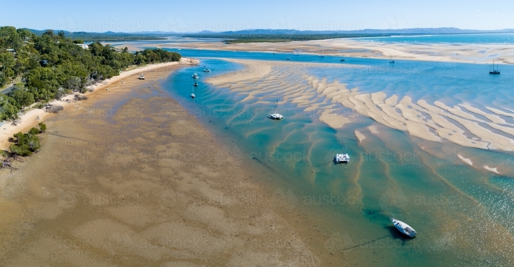 Aerial panorama of Round Hill Creek and Bustard Bay, the Town of 1770, QLD. - Australian Stock Image