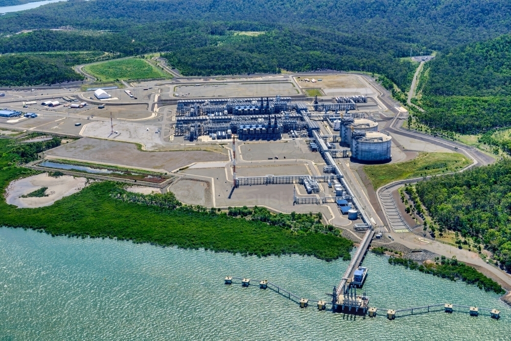 Aerial shot of liquified natural gas plants on Curtis Island, Queensland - Australian Stock Image