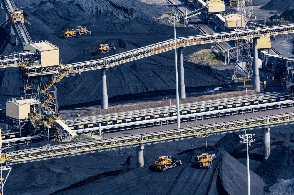 Aerial shot of RG Tanna coal piles in Gladstone, Queensland - Australian Stock Image