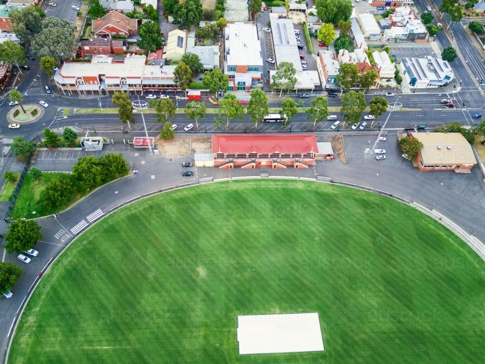 Aerial view a football oval and grandstand. - Australian Stock Image