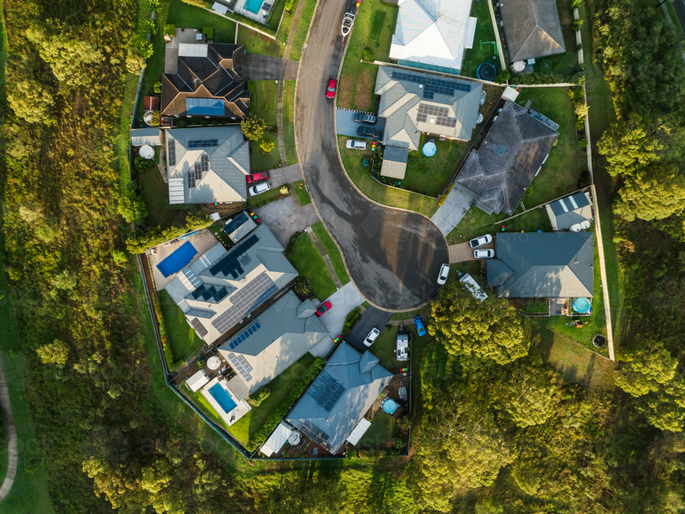 Aerial view houses at the end of a cul-de-sac quiet road with cars in driveways - Australian Stock Image