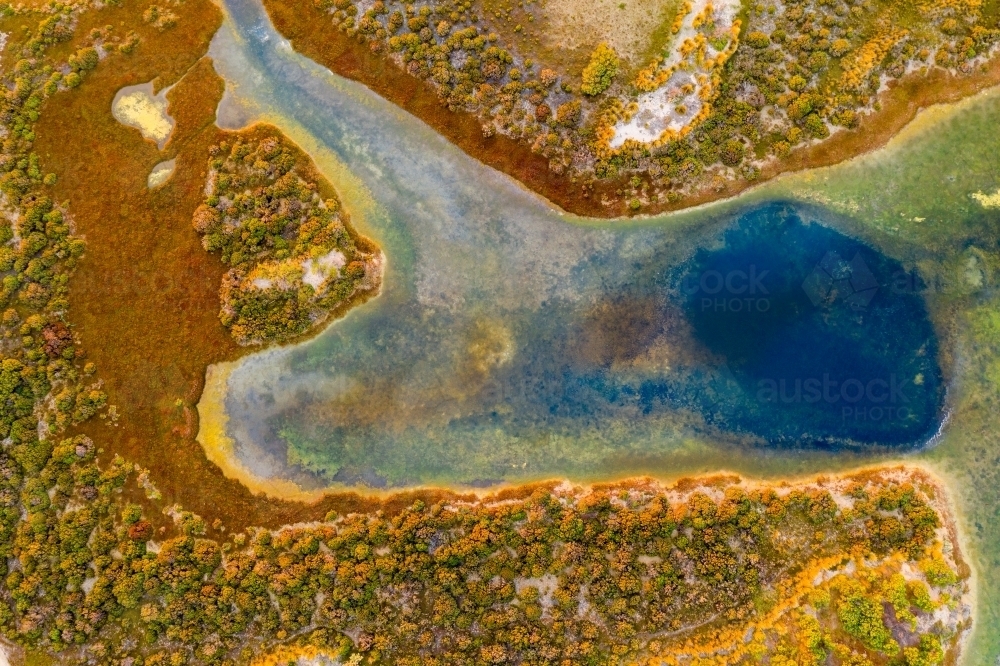 Aerial view of a coastal lagoon surrounded by scrub - Australian Stock Image