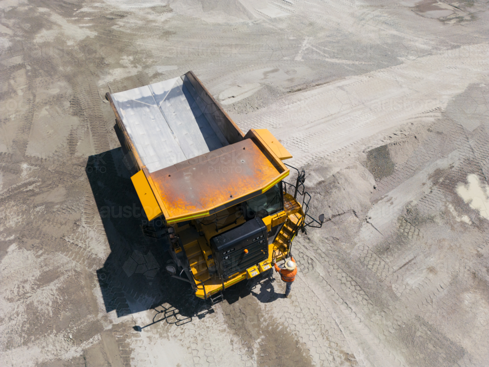 Aerial view of a dump truck in a quarry. - Australian Stock Image