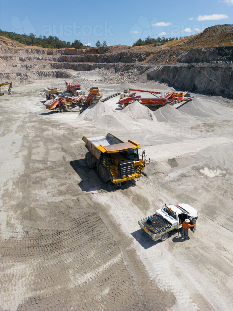 Aerial view of a dump truck in a quarry. - Australian Stock Image