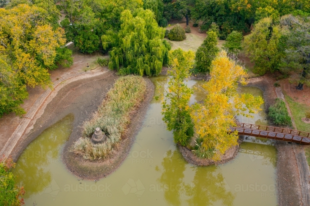 Aerial view of a garden lake with islands in Autumn - Australian Stock Image