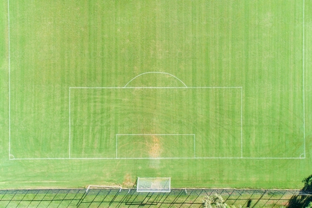 Aerial view of a grassy soccer football field and goals. - Australian Stock Image