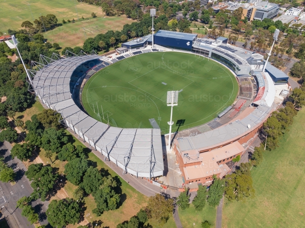 Aerial view of a large Aussie rules Football Stadium surrounded by parkland - Australian Stock Image