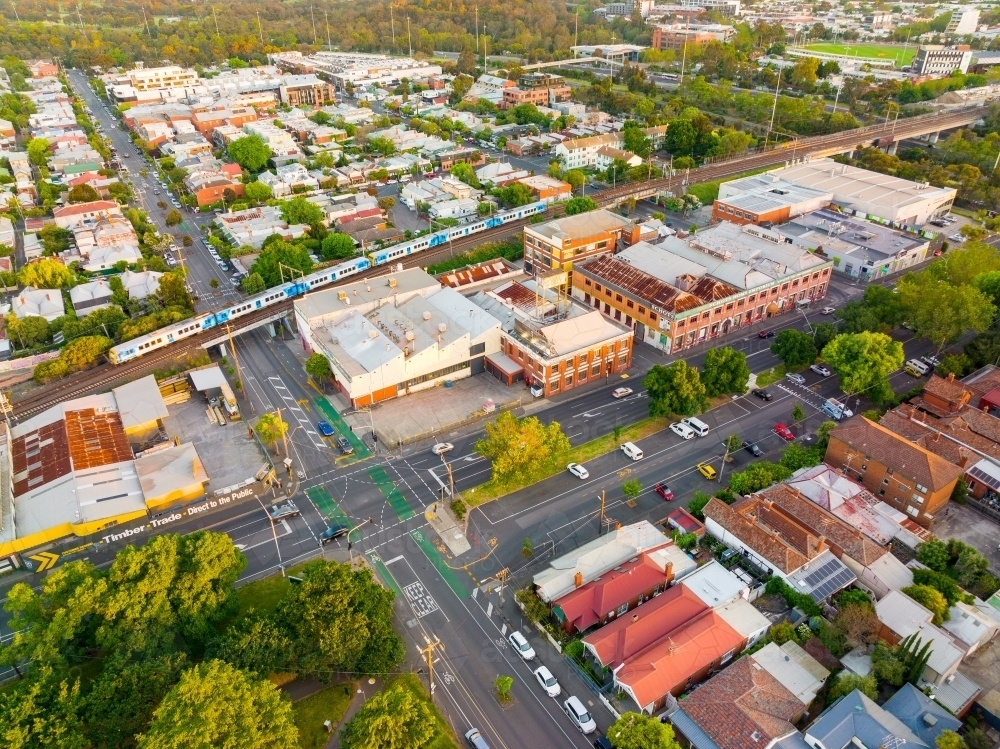 Aerial view of a metro train road intersections in an inner city suburb - Australian Stock Image