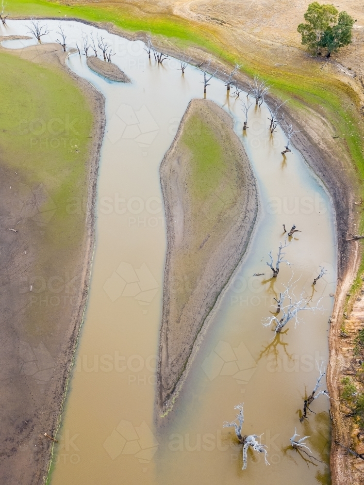 Aerial view of a river winding through farmland - Australian Stock Image