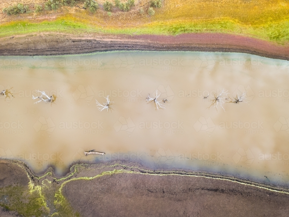 Aerial view of a river winding through farmland - Australian Stock Image