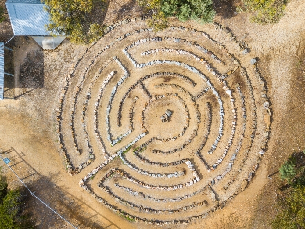 Aerial view of a stone maze laid out on the ground - Australian Stock Image