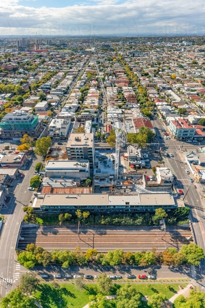 Aerial view of a suburban railway line between two road bridges - Australian Stock Image