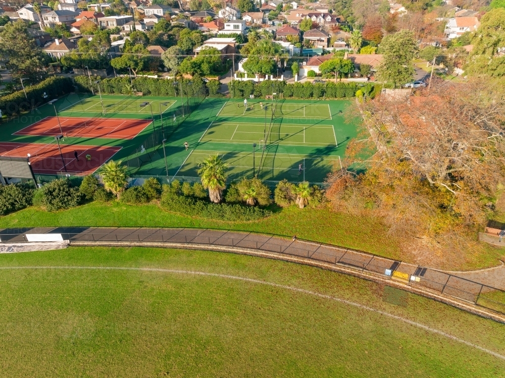 Aerial view of a suburban sports oval and tennis courts in Kew - Australian Stock Image