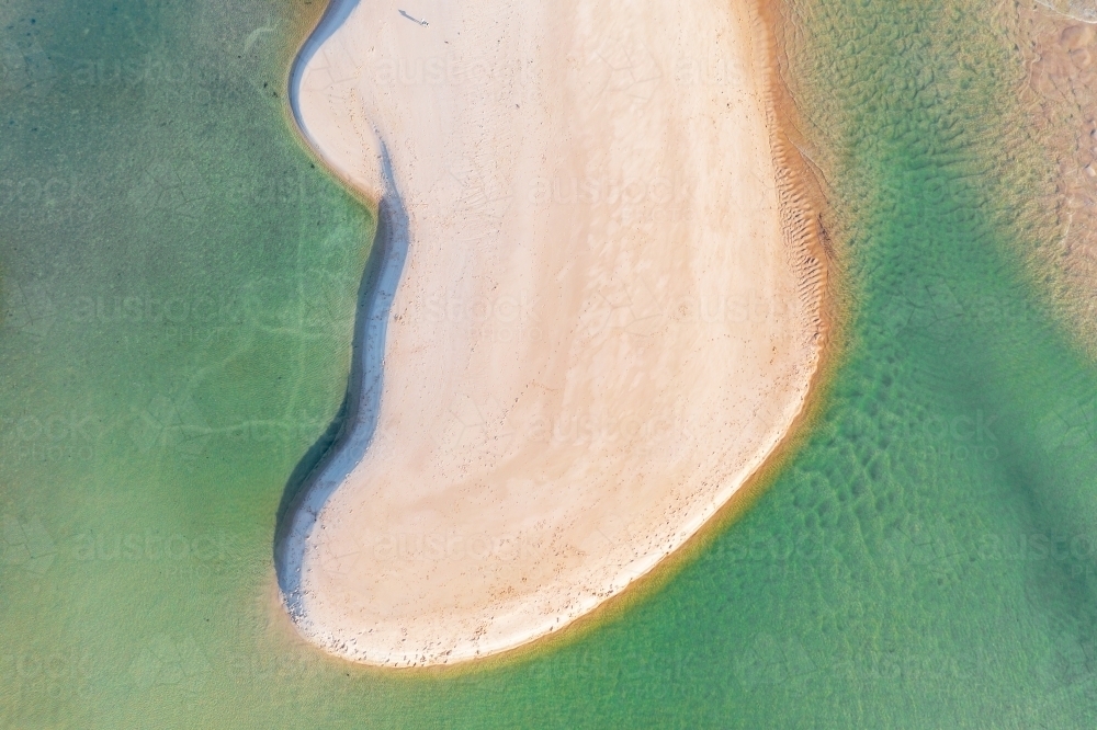 Aerial view of a tidal sand bar in a blue green sea - Australian Stock Image