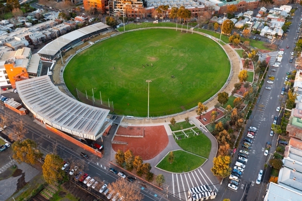 Aerial view of an AFL football stadium amongst suburban housing - Australian Stock Image