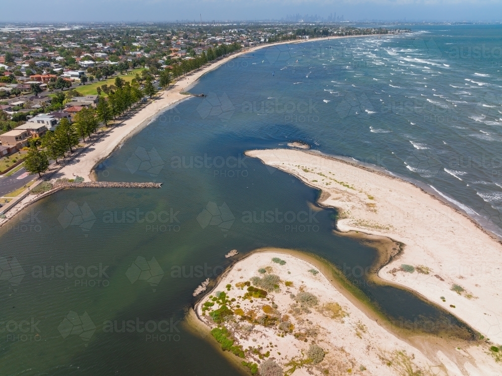 Aerial view of an unusually shaped sand bar running along a bayside beach - Australian Stock Image